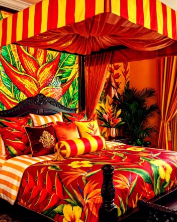 Bright Orange and Yellow Energetic Caribbean Tropical Bedroom Design Idea featuring bold stripes and exotic floral print
